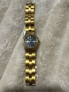 Vintage Eaton Women’s Gold Tone Watch Blue Dial Roman Numerals Date 10 ATM